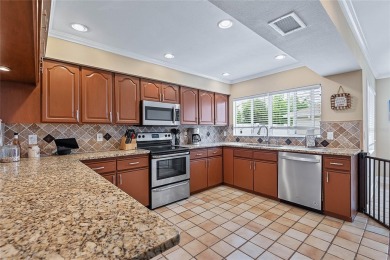 Welcome to this beautifully maintained 3-bedroom, 2-bath home on The Grand Club - Pine Lakes Course in Florida - for sale on GolfHomes.com, golf home, golf lot