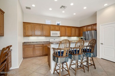 Overlooking the majestic Santa Rita Mountains in the gated Canoa on Canoa Ranch Golf Club in Arizona - for sale on GolfHomes.com, golf home, golf lot