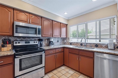 Welcome to this beautifully maintained 3-bedroom, 2-bath home on The Grand Club - Pine Lakes Course in Florida - for sale on GolfHomes.com, golf home, golf lot