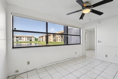 Beautifully Renovated 1st-Floor Waterfront Condo in Active 55+ on Sunrise Lakes Phase IV Golf Course in Florida - for sale on GolfHomes.com, golf home, golf lot