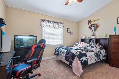 Welcome to this beautifully maintained 3-bedroom, 2-bath home on The Grand Club - Pine Lakes Course in Florida - for sale on GolfHomes.com, golf home, golf lot