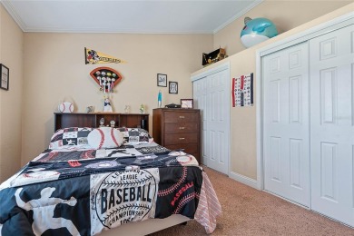 Welcome to this beautifully maintained 3-bedroom, 2-bath home on The Grand Club - Pine Lakes Course in Florida - for sale on GolfHomes.com, golf home, golf lot