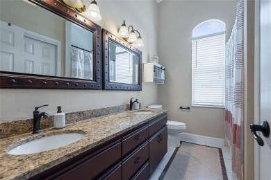Welcome to this beautifully maintained 3-bedroom, 2-bath home on The Grand Club - Pine Lakes Course in Florida - for sale on GolfHomes.com, golf home, golf lot