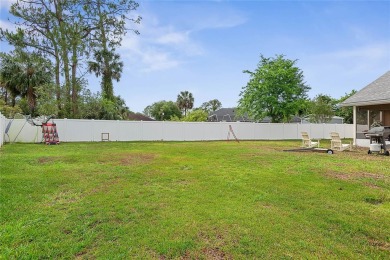 Welcome to this beautifully maintained 3-bedroom, 2-bath home on The Grand Club - Pine Lakes Course in Florida - for sale on GolfHomes.com, golf home, golf lot