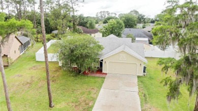 Welcome to this beautifully maintained 3-bedroom, 2-bath home on The Grand Club - Pine Lakes Course in Florida - for sale on GolfHomes.com, golf home, golf lot