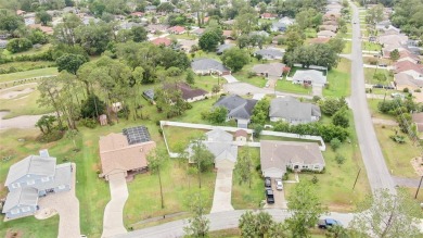 Welcome to this beautifully maintained 3-bedroom, 2-bath home on The Grand Club - Pine Lakes Course in Florida - for sale on GolfHomes.com, golf home, golf lot