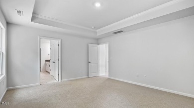 Welcome to 7581 Percussion Drive at Horton Park, located in Apex on Knights Play Golf Center in North Carolina - for sale on GolfHomes.com, golf home, golf lot