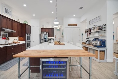 Experience life to the fullest in this 4 bedroom / 3 full bath on Harbor Hills Country Club in Florida - for sale on GolfHomes.com, golf home, golf lot