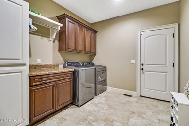 Welcome home to this beautiful 3-bedroom, 2.5-bath brick and on Heatherhurst Golf Course in Tennessee - for sale on GolfHomes.com, golf home, golf lot