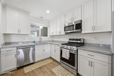 Welcome To This Updated And Expanded Shasta Model Home In Sun on Sun City Lakes West and East in Arizona - for sale on GolfHomes.com, golf home, golf lot