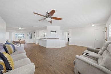 Welcome To This Updated And Expanded Shasta Model Home In Sun on Sun City Lakes West and East in Arizona - for sale on GolfHomes.com, golf home, golf lot