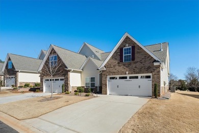 Welcome to 106 Coosa Lane, an elegant end unit townhome in the on Cobbs Glen Country Club in South Carolina - for sale on GolfHomes.com, golf home, golf lot