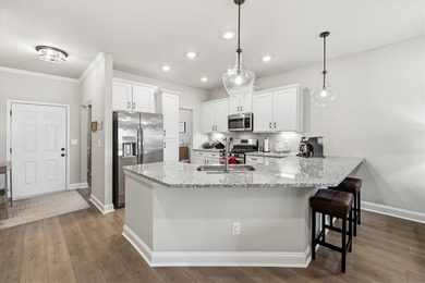 Welcome to 106 Coosa Lane, an elegant end unit townhome in the on Cobbs Glen Country Club in South Carolina - for sale on GolfHomes.com, golf home, golf lot