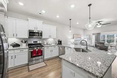 Welcome to 106 Coosa Lane, an elegant end unit townhome in the on Cobbs Glen Country Club in South Carolina - for sale on GolfHomes.com, golf home, golf lot