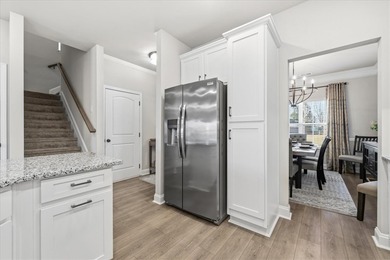 Welcome to 106 Coosa Lane, an elegant end unit townhome in the on Cobbs Glen Country Club in South Carolina - for sale on GolfHomes.com, golf home, golf lot