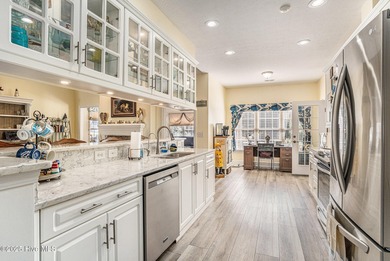 Live where every day feels like vacation! This custom, all brick on Sea Trail Golf Resort in North Carolina - for sale on GolfHomes.com, golf home, golf lot