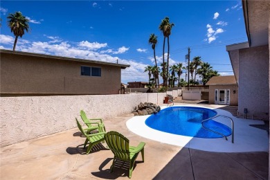 Welcome to 2475 Saratoga located on a premium corner lot, this on London Bridge Golf Course in Arizona - for sale on GolfHomes.com, golf home, golf lot