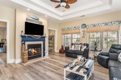 Live where every day feels like vacation! This custom, all brick on Sea Trail Golf Resort in North Carolina - for sale on GolfHomes.com, golf home, golf lot