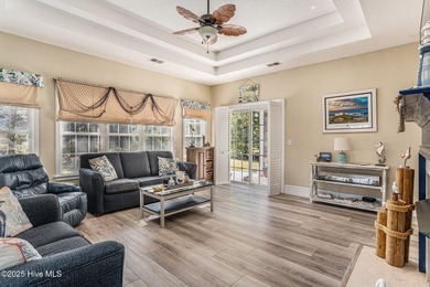 Live where every day feels like vacation! This custom, all brick on Sea Trail Golf Resort in North Carolina - for sale on GolfHomes.com, golf home, golf lot