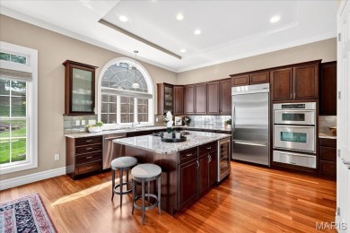 Experience luxury living in this stunning villa, perfectly on Meadowbrook Country Club in Missouri - for sale on GolfHomes.com, golf home, golf lot