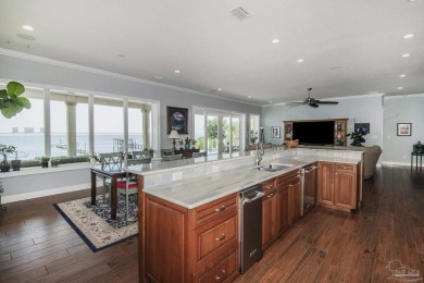 This stunning ICF waterfront home, featuring 135 feet on the on Tiger Point Golf and Country Club in Florida - for sale on GolfHomes.com, golf home, golf lot