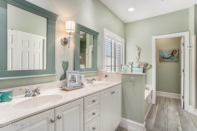 Live where every day feels like vacation! This custom, all brick on Sea Trail Golf Resort in North Carolina - for sale on GolfHomes.com, golf home, golf lot