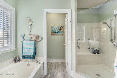 Live where every day feels like vacation! This custom, all brick on Sea Trail Golf Resort in North Carolina - for sale on GolfHomes.com, golf home, golf lot