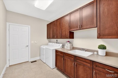 Experience luxury living in this stunning villa, perfectly on Meadowbrook Country Club in Missouri - for sale on GolfHomes.com, golf home, golf lot