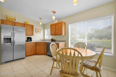 Discover effortless living in this charming Clayton model patio on Okatie Creek Golf Club in South Carolina - for sale on GolfHomes.com, golf home, golf lot