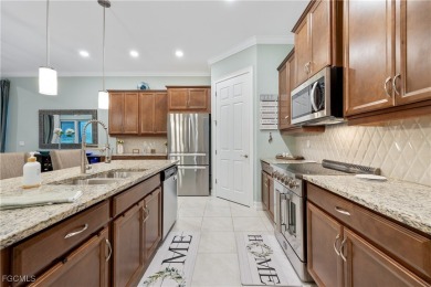 Exquisite Former Model Home in Magnolia Landing! Welcome to this on Herons Glen Golf and Country Club in Florida - for sale on GolfHomes.com, golf home, golf lot