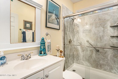 Live where every day feels like vacation! This custom, all brick on Sea Trail Golf Resort in North Carolina - for sale on GolfHomes.com, golf home, golf lot