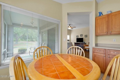 Discover effortless living in this charming Clayton model patio on Okatie Creek Golf Club in South Carolina - for sale on GolfHomes.com, golf home, golf lot