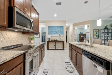 Exquisite Former Model Home in Magnolia Landing! Welcome to this on Herons Glen Golf and Country Club in Florida - for sale on GolfHomes.com, golf home, golf lot
