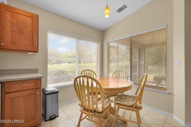 Discover effortless living in this charming Clayton model patio on Okatie Creek Golf Club in South Carolina - for sale on GolfHomes.com, golf home, golf lot