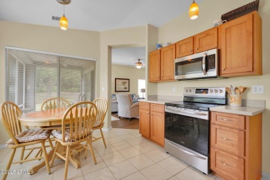 Discover effortless living in this charming Clayton model patio on Okatie Creek Golf Club in South Carolina - for sale on GolfHomes.com, golf home, golf lot