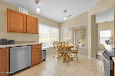 Discover effortless living in this charming Clayton model patio on Okatie Creek Golf Club in South Carolina - for sale on GolfHomes.com, golf home, golf lot