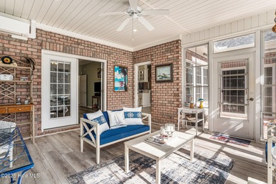Live where every day feels like vacation! This custom, all brick on Sea Trail Golf Resort in North Carolina - for sale on GolfHomes.com, golf home, golf lot