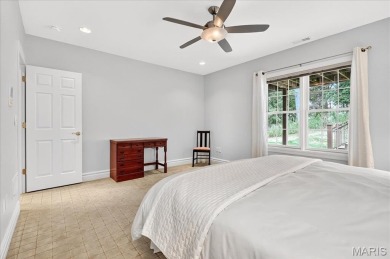 Experience luxury living in this stunning villa, perfectly on Meadowbrook Country Club in Missouri - for sale on GolfHomes.com, golf home, golf lot