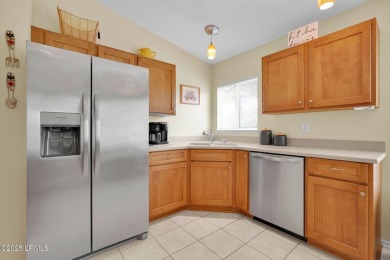 Discover effortless living in this charming Clayton model patio on Okatie Creek Golf Club in South Carolina - for sale on GolfHomes.com, golf home, golf lot