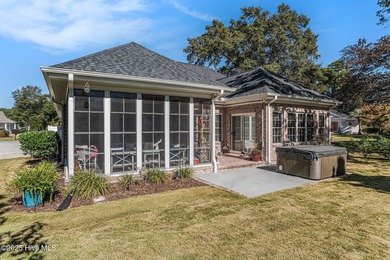 Live where every day feels like vacation! This custom, all brick on Sea Trail Golf Resort in North Carolina - for sale on GolfHomes.com, golf home, golf lot