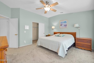 Discover effortless living in this charming Clayton model patio on Okatie Creek Golf Club in South Carolina - for sale on GolfHomes.com, golf home, golf lot