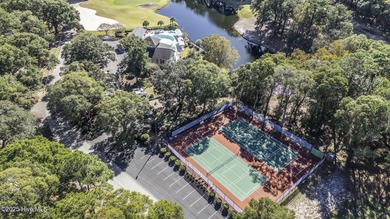 Live where every day feels like vacation! This custom, all brick on Sea Trail Golf Resort in North Carolina - for sale on GolfHomes.com, golf home, golf lot