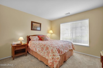 Discover effortless living in this charming Clayton model patio on Okatie Creek Golf Club in South Carolina - for sale on GolfHomes.com, golf home, golf lot