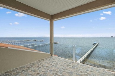 This stunning ICF waterfront home, featuring 135 feet on the on Tiger Point Golf and Country Club in Florida - for sale on GolfHomes.com, golf home, golf lot