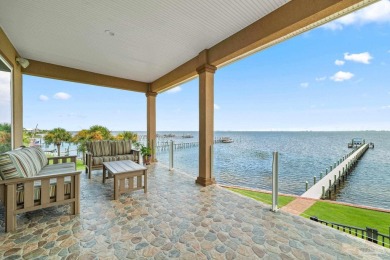 This stunning ICF waterfront home, featuring 135 feet on the on Tiger Point Golf and Country Club in Florida - for sale on GolfHomes.com, golf home, golf lot