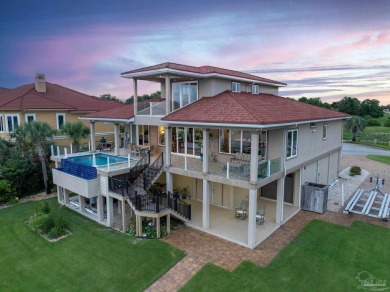 This stunning ICF waterfront home, featuring 135 feet on the on Tiger Point Golf and Country Club in Florida - for sale on GolfHomes.com, golf home, golf lot