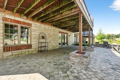 Experience luxury living in this stunning villa, perfectly on Meadowbrook Country Club in Missouri - for sale on GolfHomes.com, golf home, golf lot