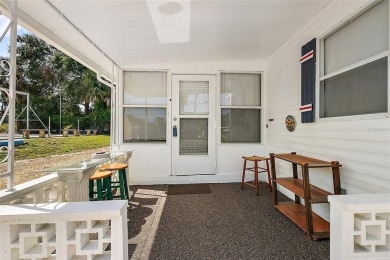 This 2-bedroom, 2-bath furnished mobile home located in the on Bay Tree Golf Course in Florida - for sale on GolfHomes.com, golf home, golf lot