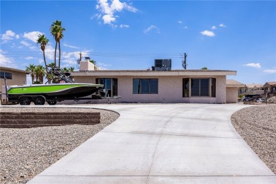 Welcome to 2475 Saratoga located on a premium corner lot, this on London Bridge Golf Course in Arizona - for sale on GolfHomes.com, golf home, golf lot