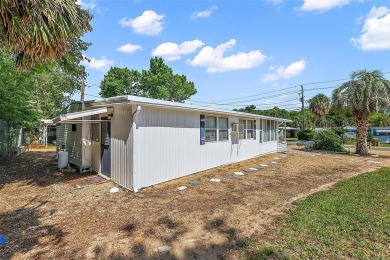 This 2-bedroom, 2-bath furnished mobile home located in the on Bay Tree Golf Course in Florida - for sale on GolfHomes.com, golf home, golf lot